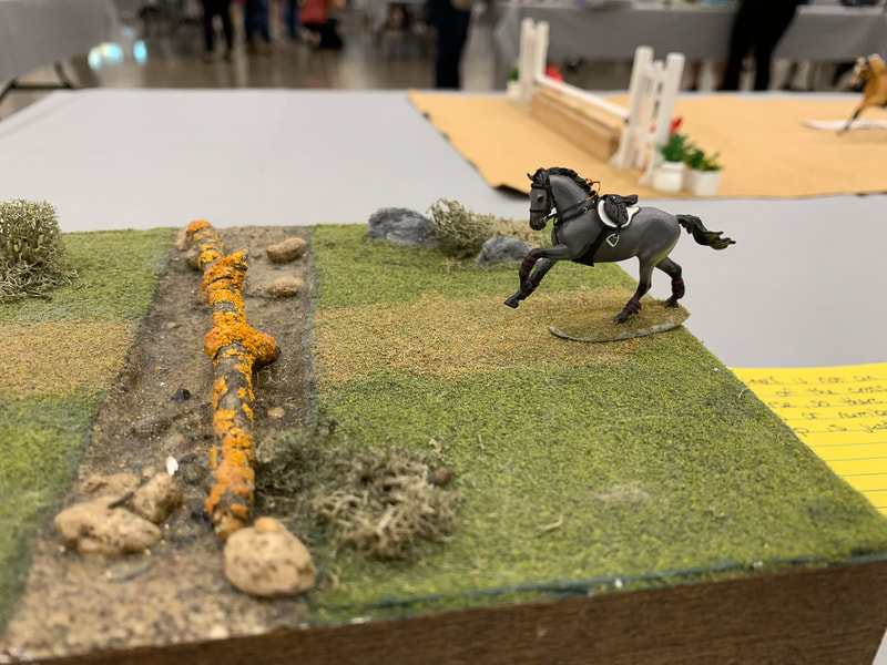 A micro mini Hazel artist resin in cross country jumping at The Jennifer Show 2019.