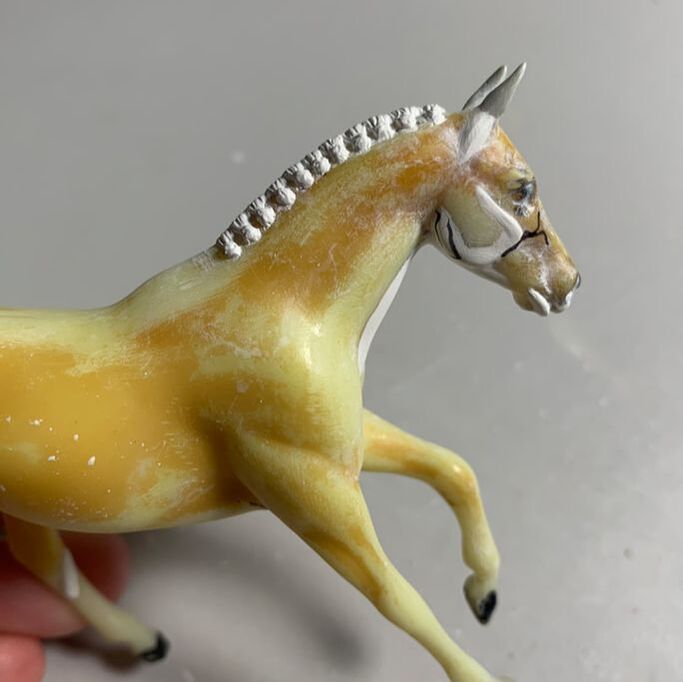In-progress braids on a model horse